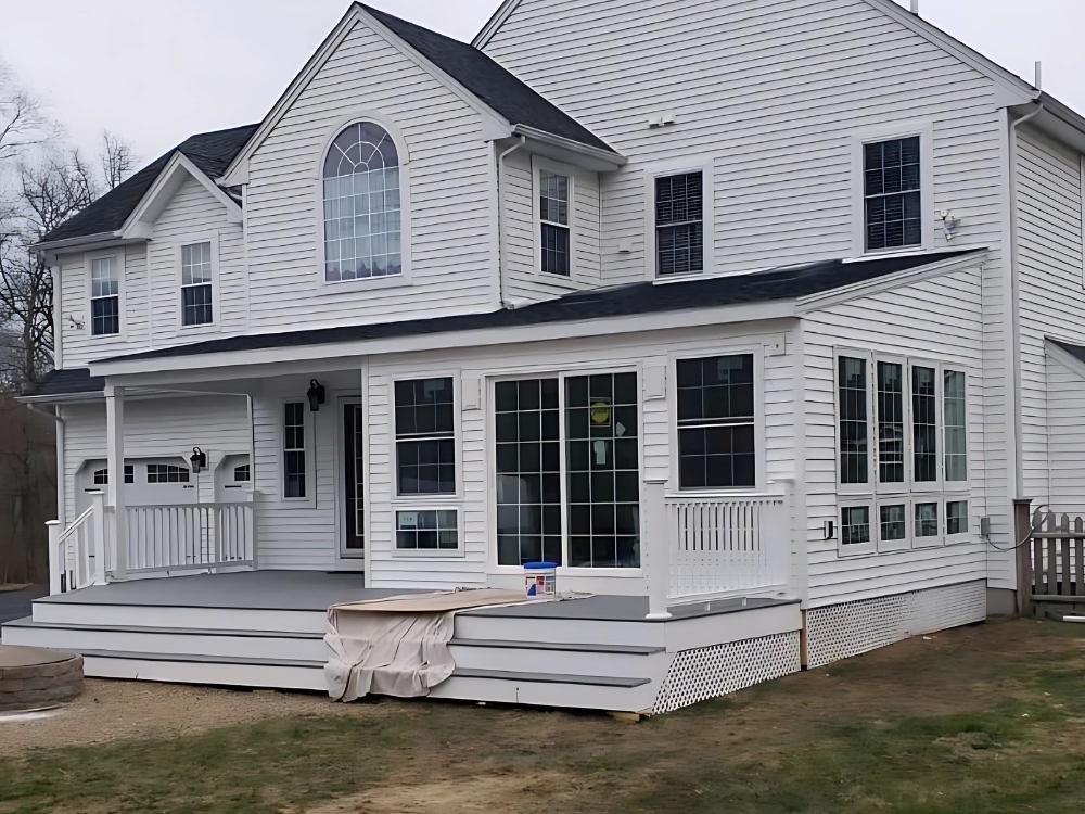 Lagace Sunroom Completed sunroom and deck addition built by Lagace Construction to expand outdoor living space